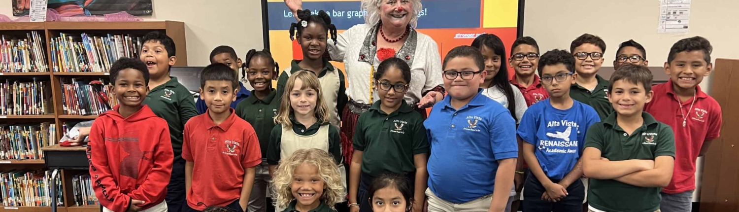 Kids enjoying circus staging equipment in a school library for educational entertainment.