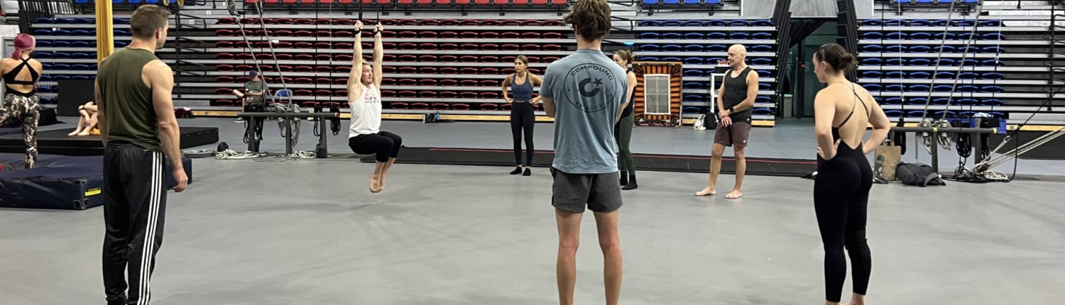 Dance and acrobatics training on circus staging at a performing arts center.
