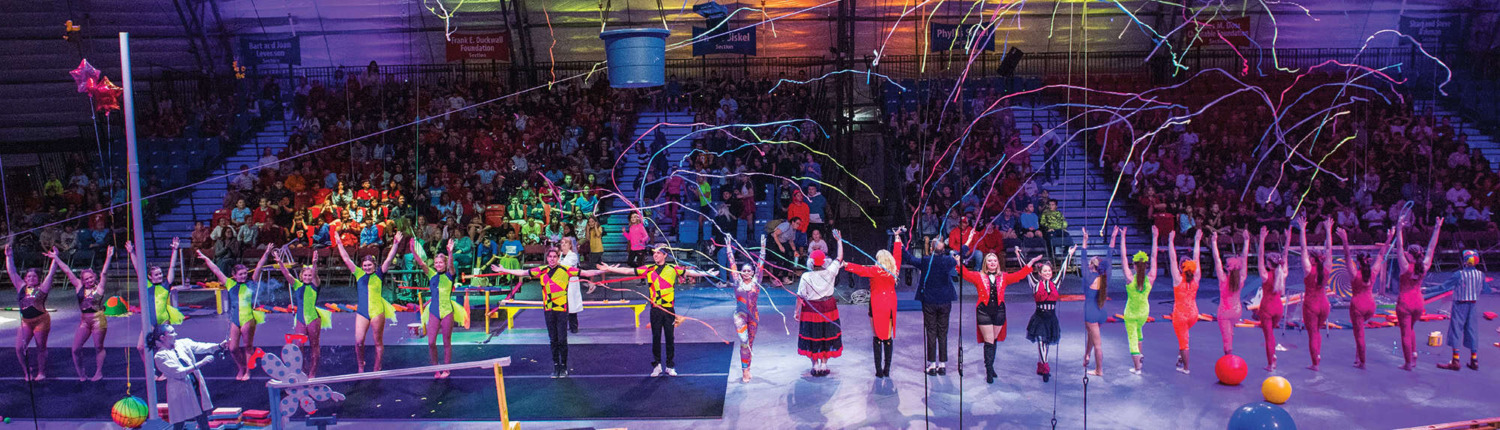 Print Circus staging with talented performers and vibrant acrobatic acts for entertainment.