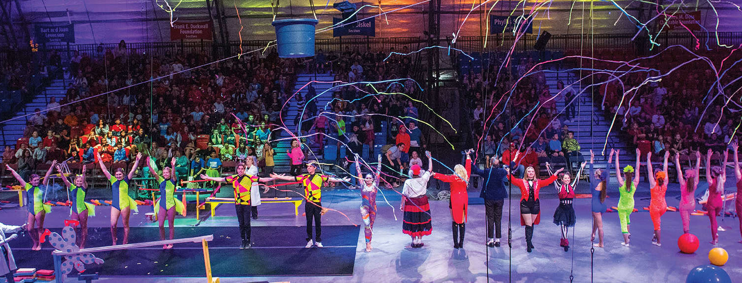 Print Circus staging with talented performers and vibrant acrobatic acts for entertainment.